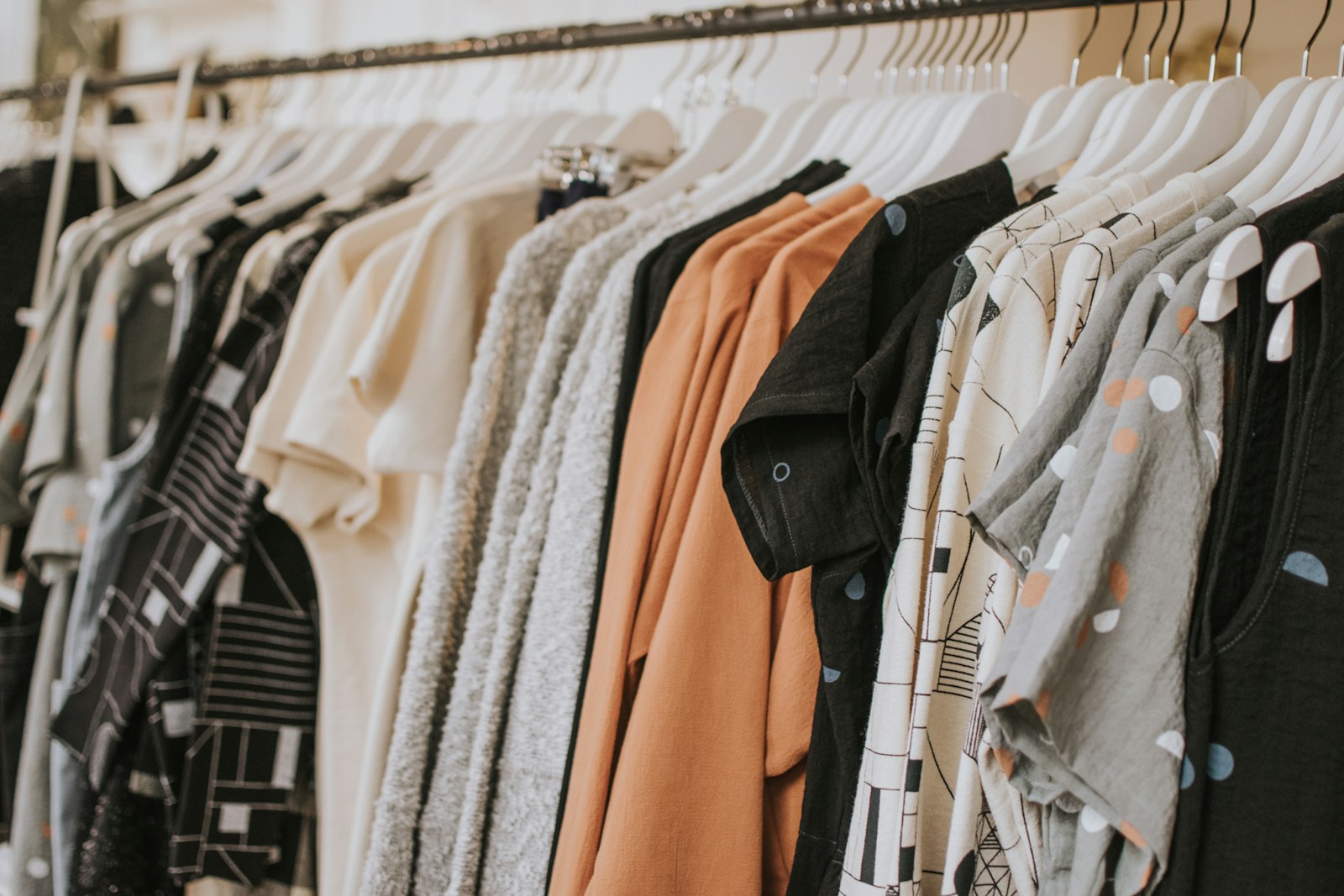 Garments hanging together on a clothing rail
